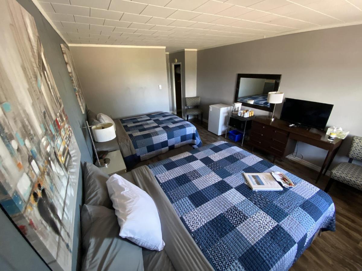 The Pines Motel And Cottages Rustico Экстерьер фото